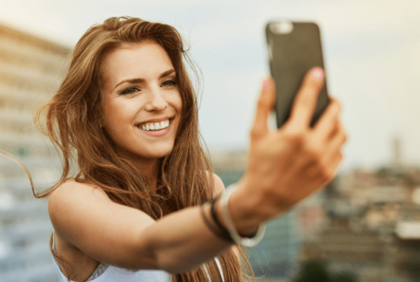 woman taking selfie