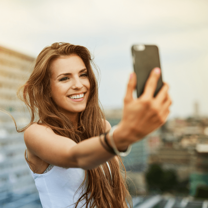 woman taking selfie