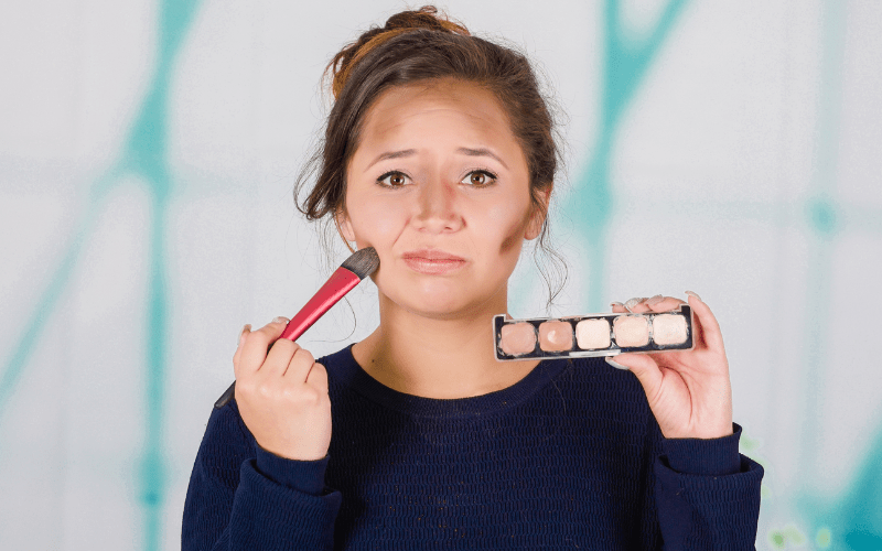 confused girl incorrectly applying contour