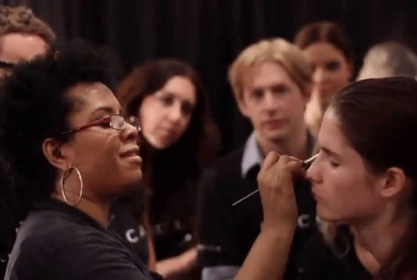 DeShawn Hatcher doing makeup on female model