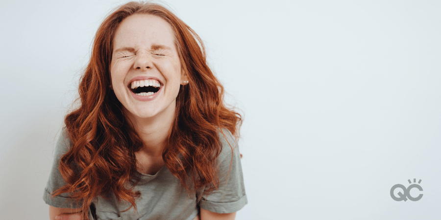 beautiful redhead woman laughing