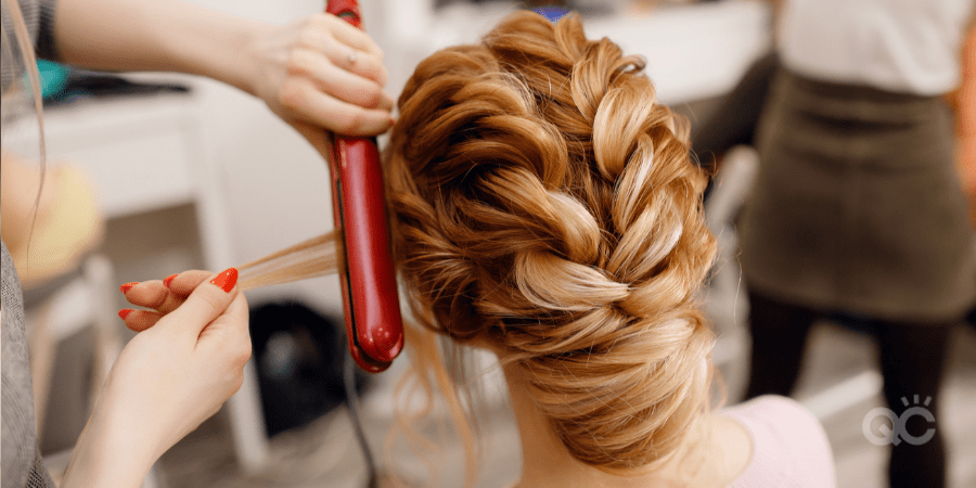 woman curling hair