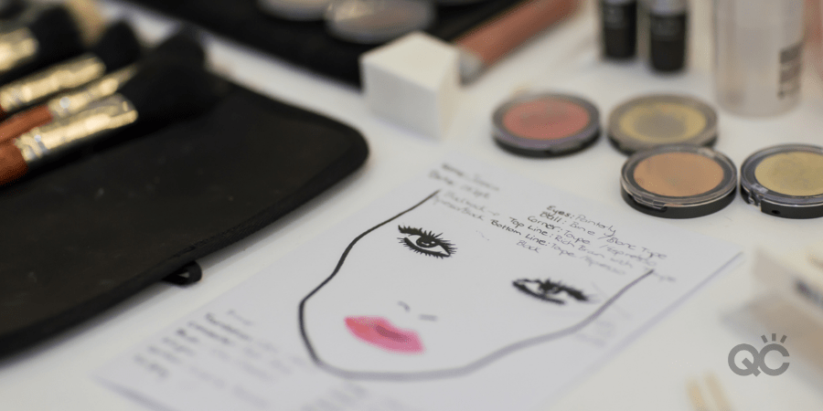 Makeup trial notes on paper with brushes and color powder professional makeup class