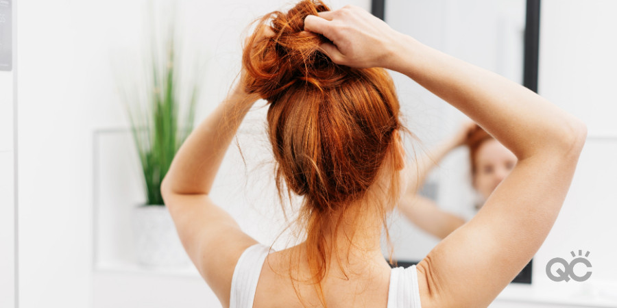 Makeup Looks to avoid on Valentines - Woman Fixing Hair