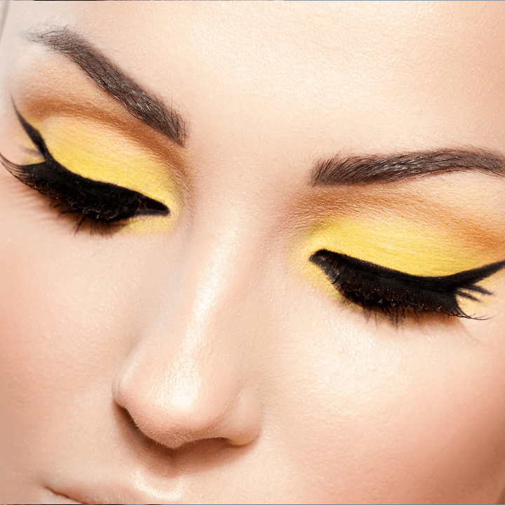 makeup career - yellow and orange eyeshadow with cat eye liner