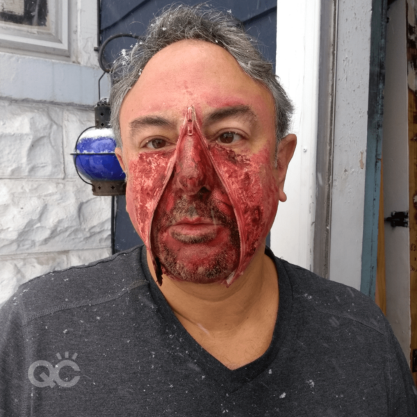 makeup artist certification graduate, Mark Lenzi, wearing zipper face SFX makeup