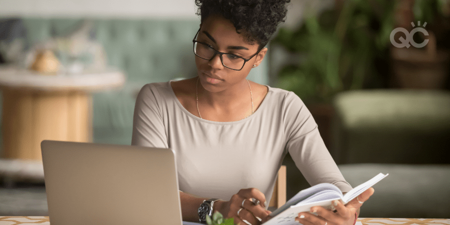 woman researching on laptop