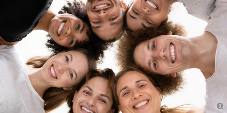 Group of happy friends in a circle