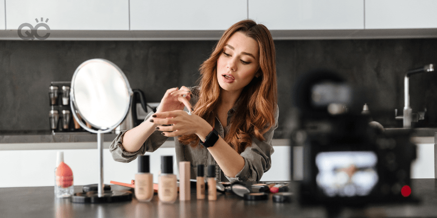 makeup artist filming herself on camera