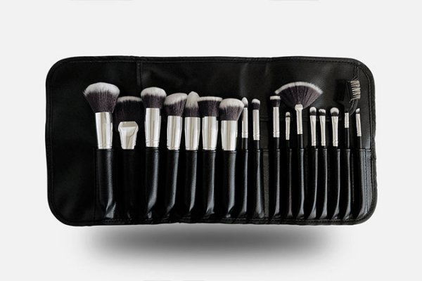 QC Makeup Academy brush set in leather case