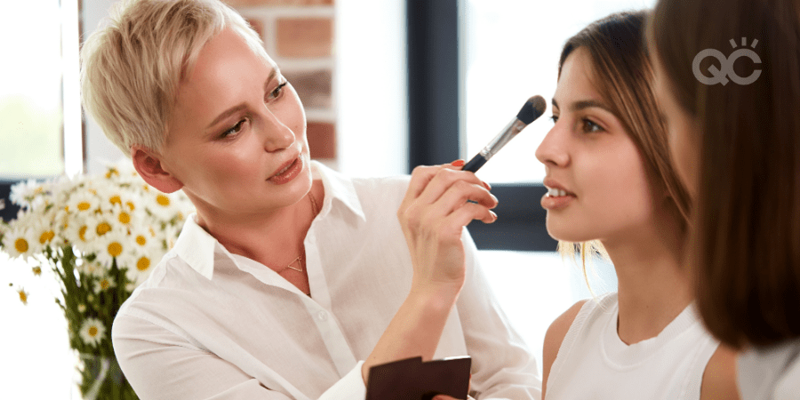 makeup student practicing on female model