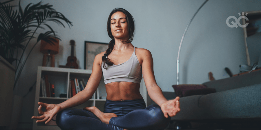 woman meditating at home