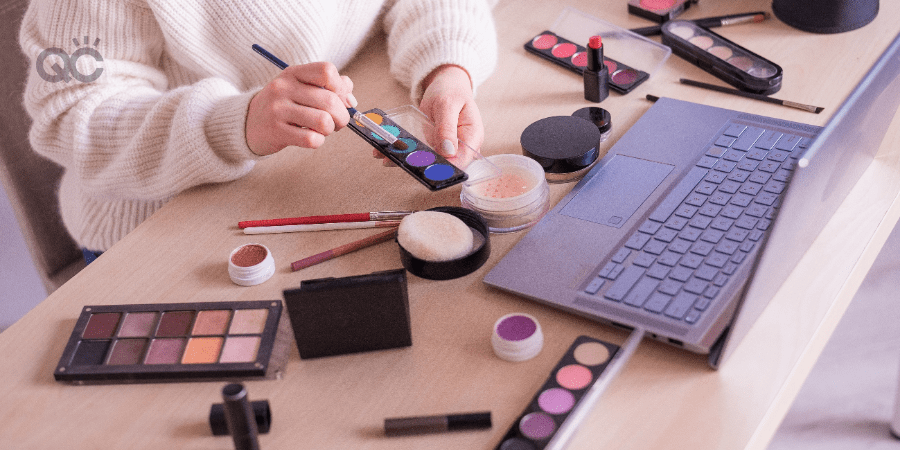 makeup career article in-post image, makeup artist doing makeup in front of laptop