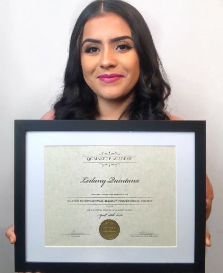 QC Makeup Academy graduate, Leilany Quintana, holding up certification