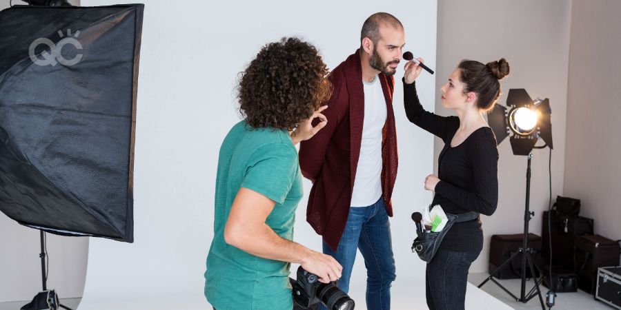 How to become a makeup artist article, May 13 2021, in-post image, MUA giving model a touch-up on set of photoshoot